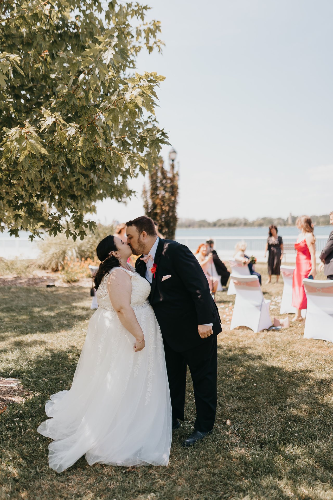 Chelsie and Greg holding hands during the ceremony