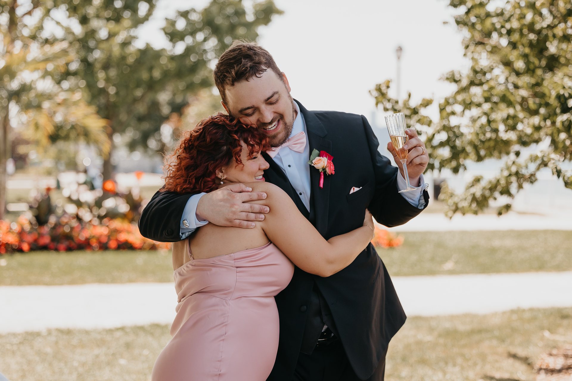 Chelsie and Greg celebrating with family after the ceremony