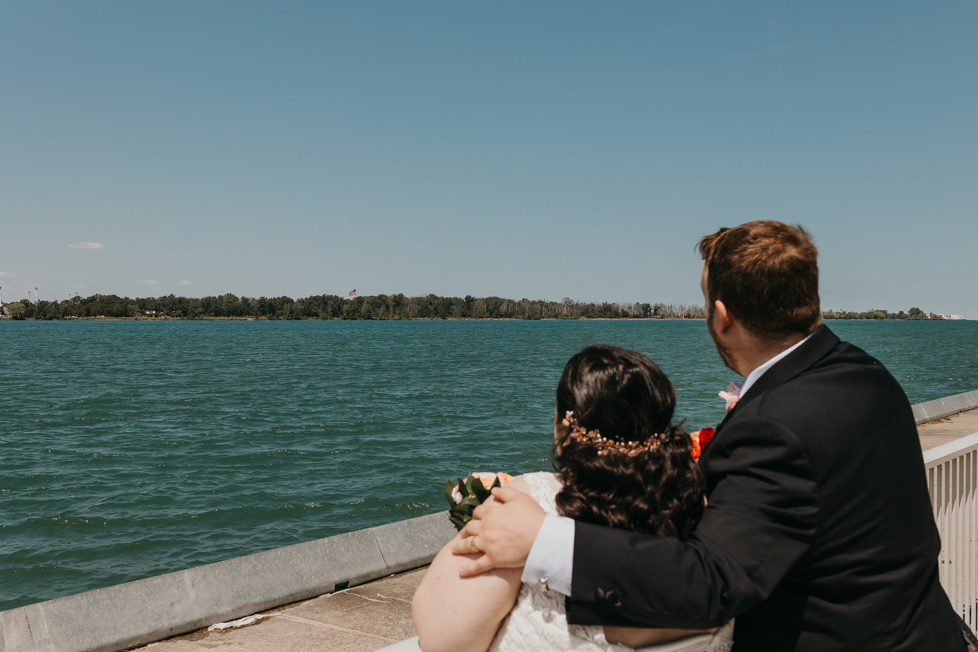Chelsie and Greg looking across the water together