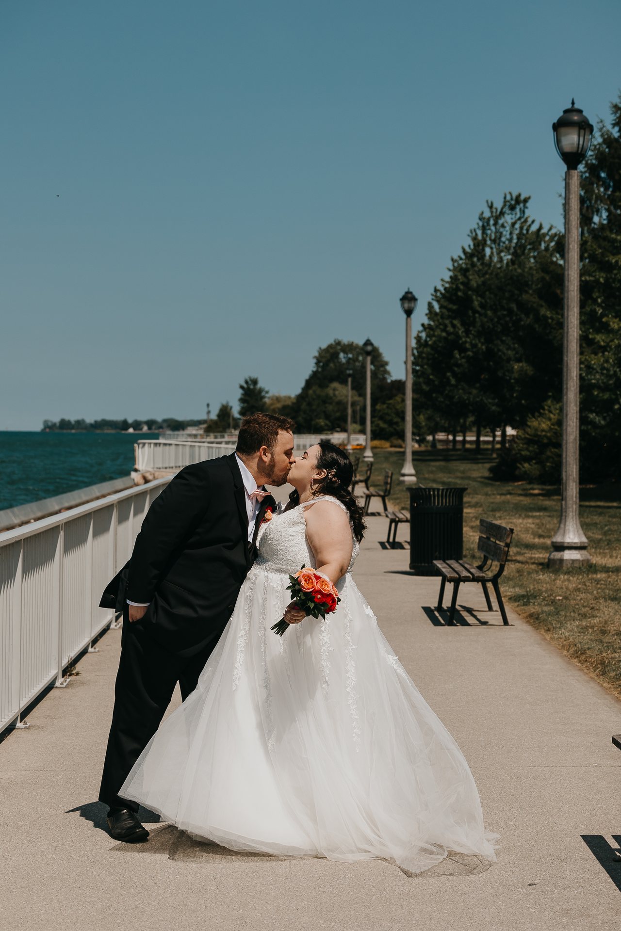 Chelsie and Greg kissing along the waterfront