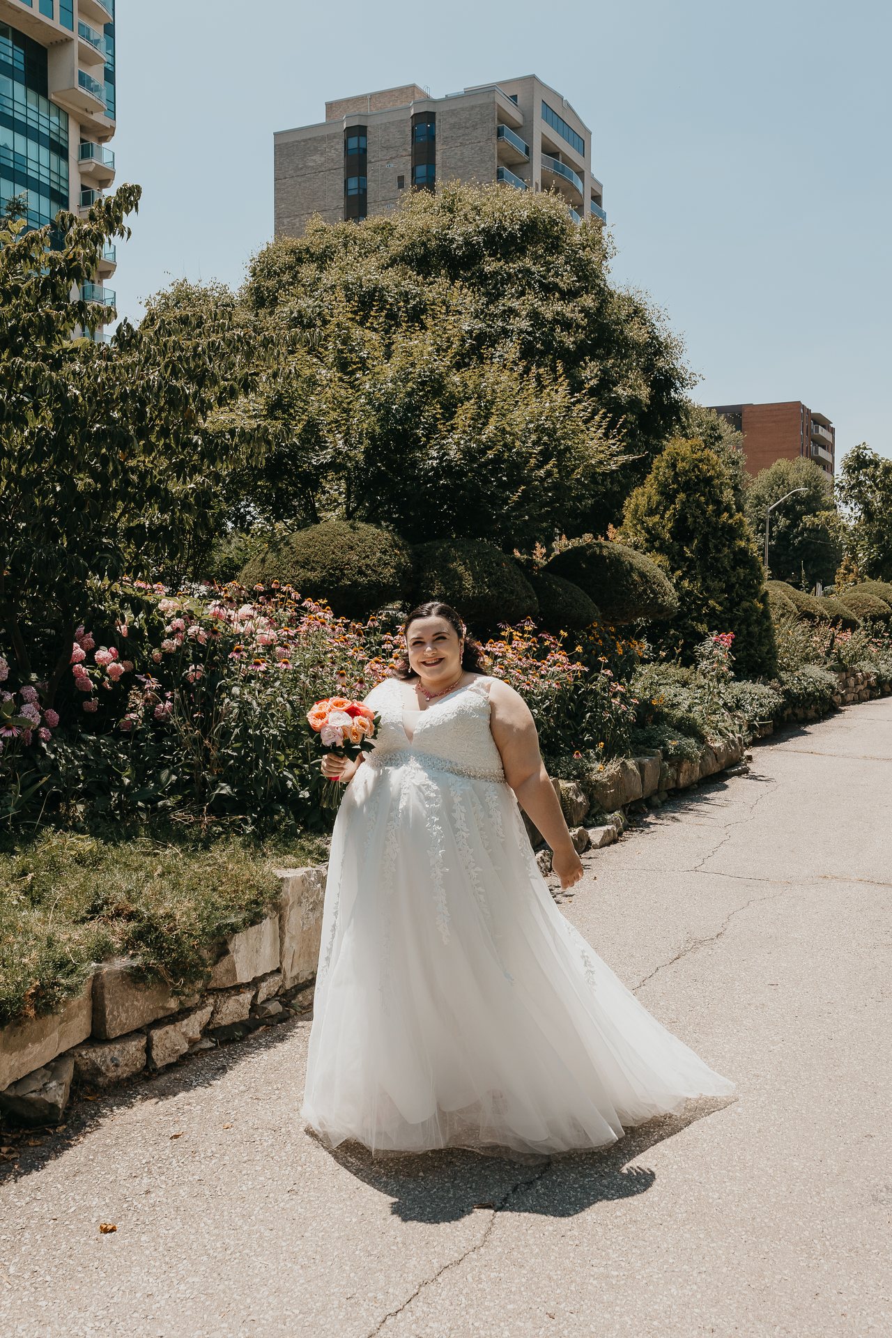 Chelsie holding her bouquet before the first look