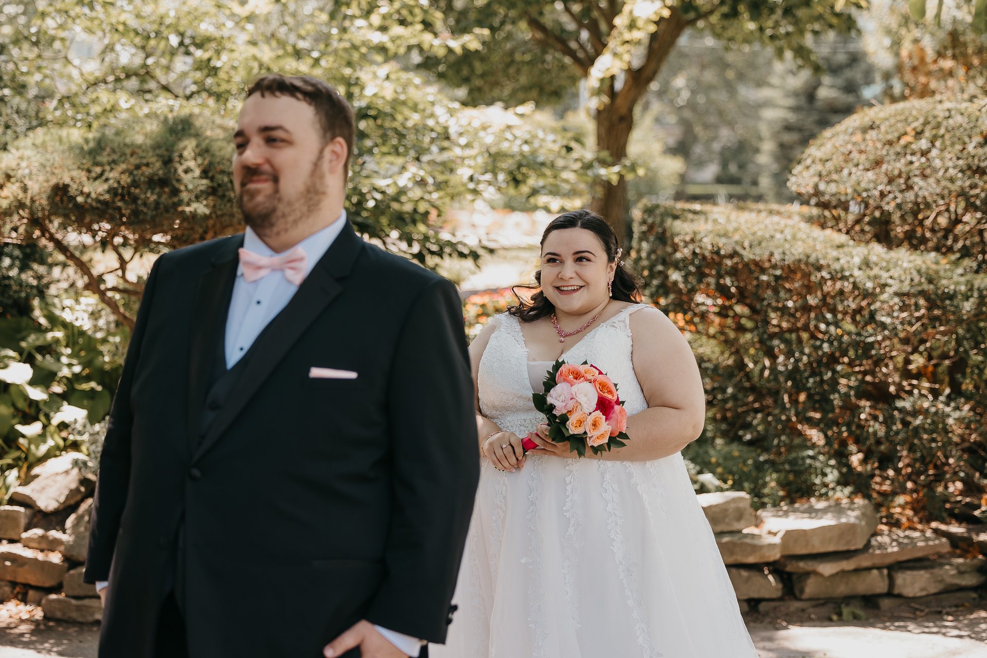 Chelsie walking up behind Greg for their first look