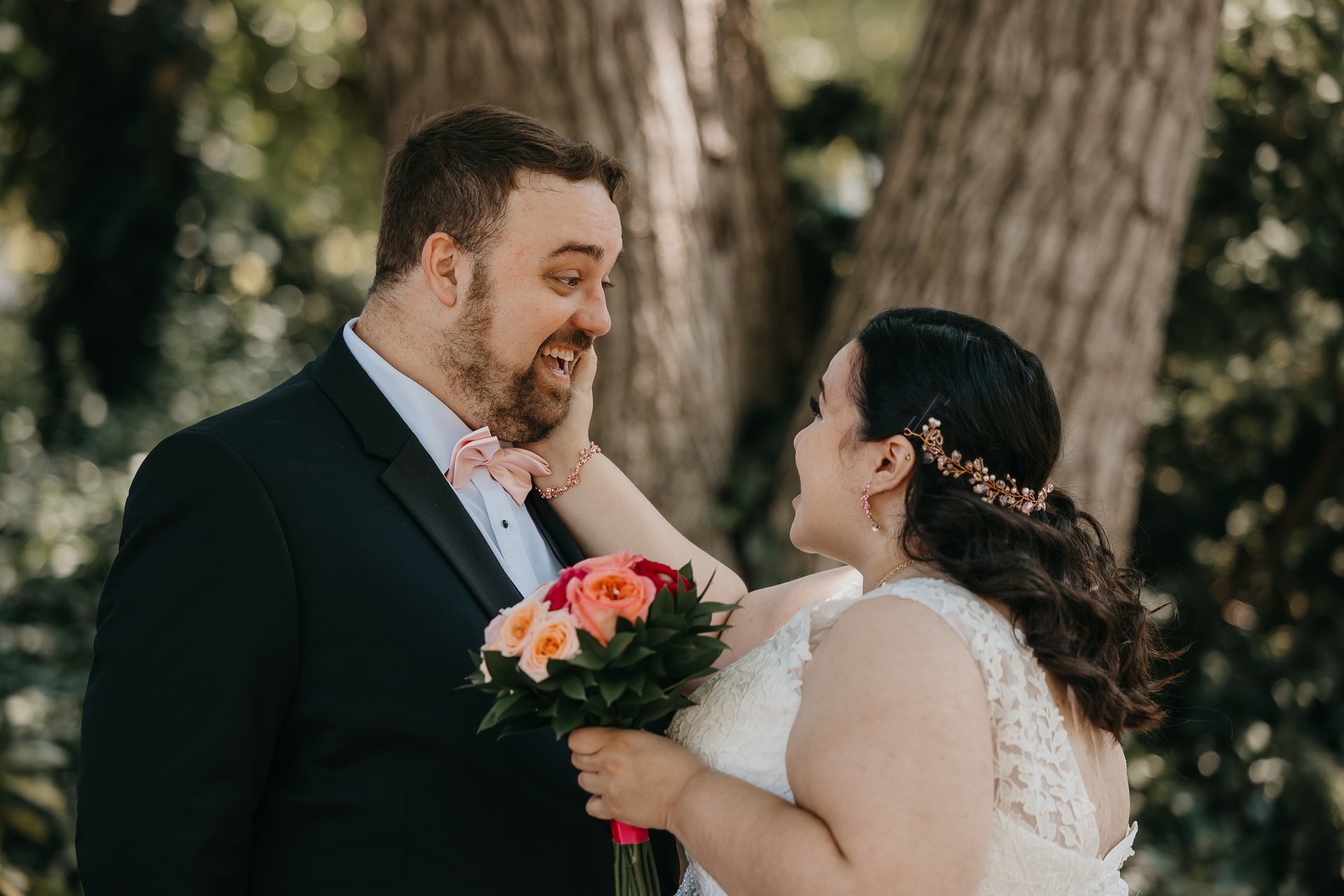 Chelsie and Greg smiling together after the first look