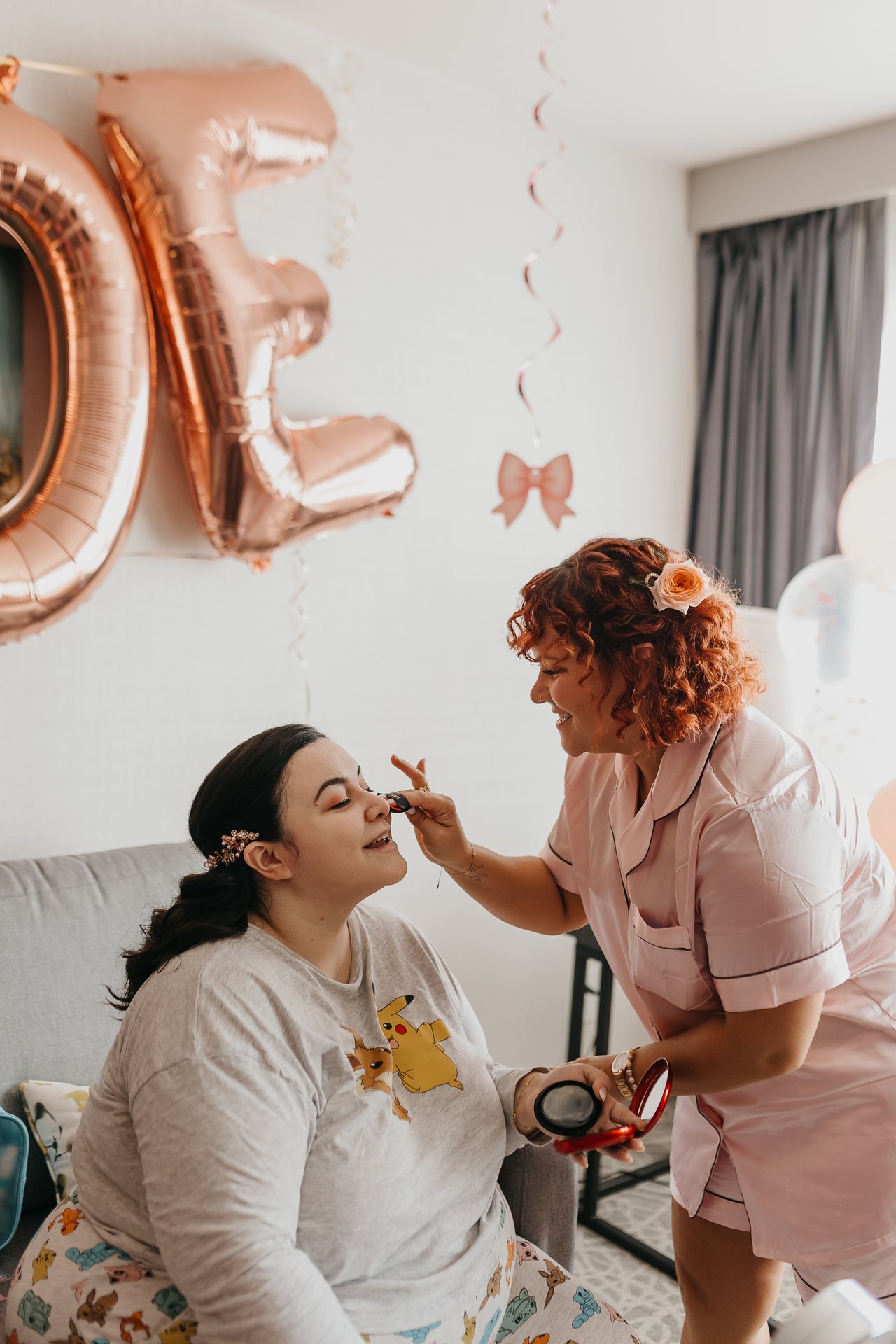 Chelsie having makeup applied before the ceremony