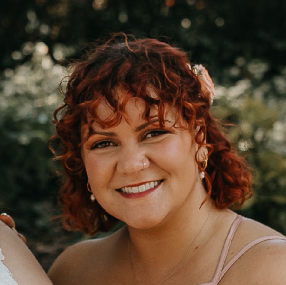 Kaitlyn Pacheco smiling outdoors